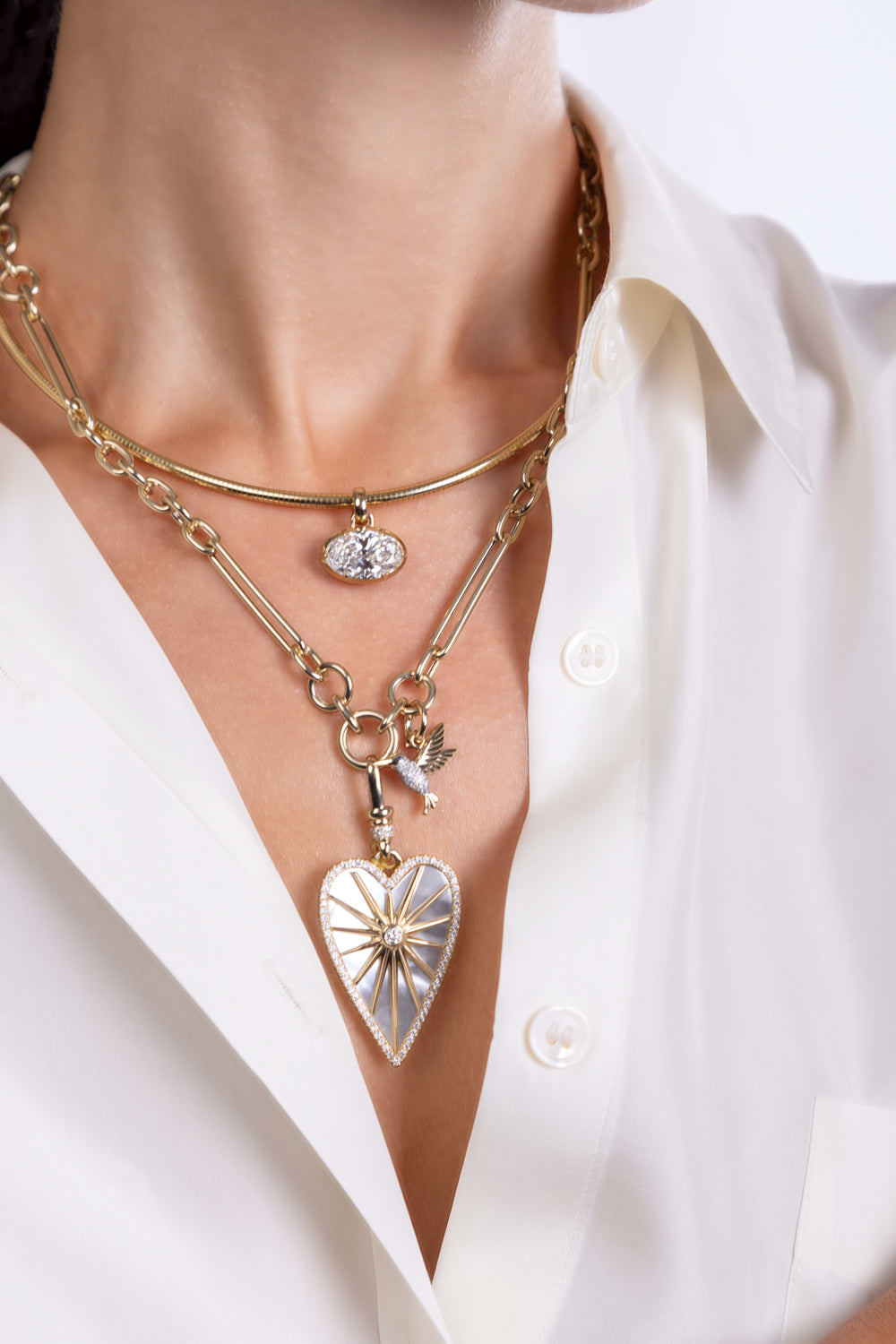 Elongated Starburst Heart Pendant