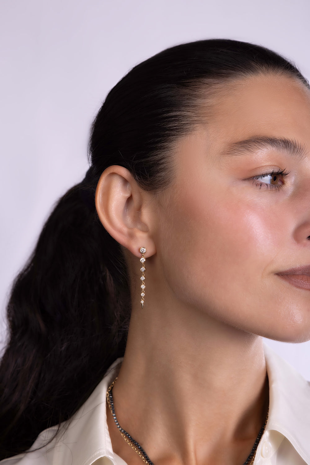Graduated Bezel Set Diamond Drop Earrings