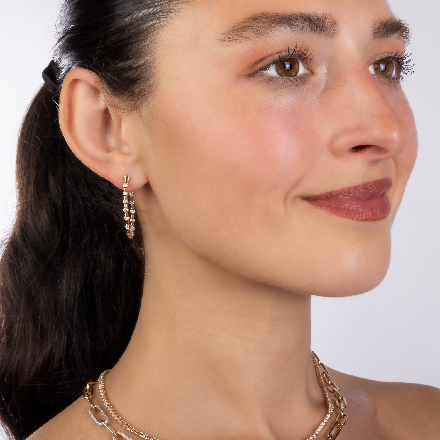 Bezel Set Diamond Oval Hoops