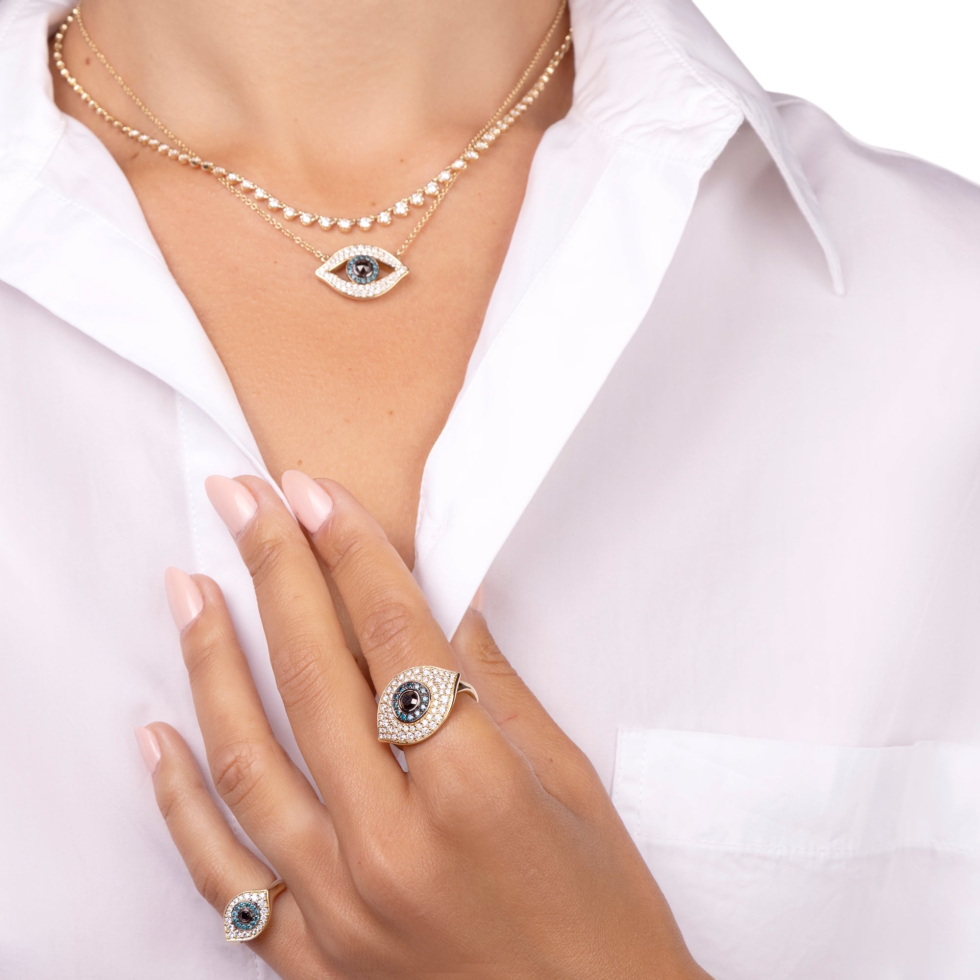 Medium Sized Diamond and Sapphire Evil Eye Ring